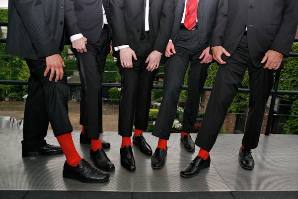 red socks for groomsmen - wedding photo by Merri Cyr